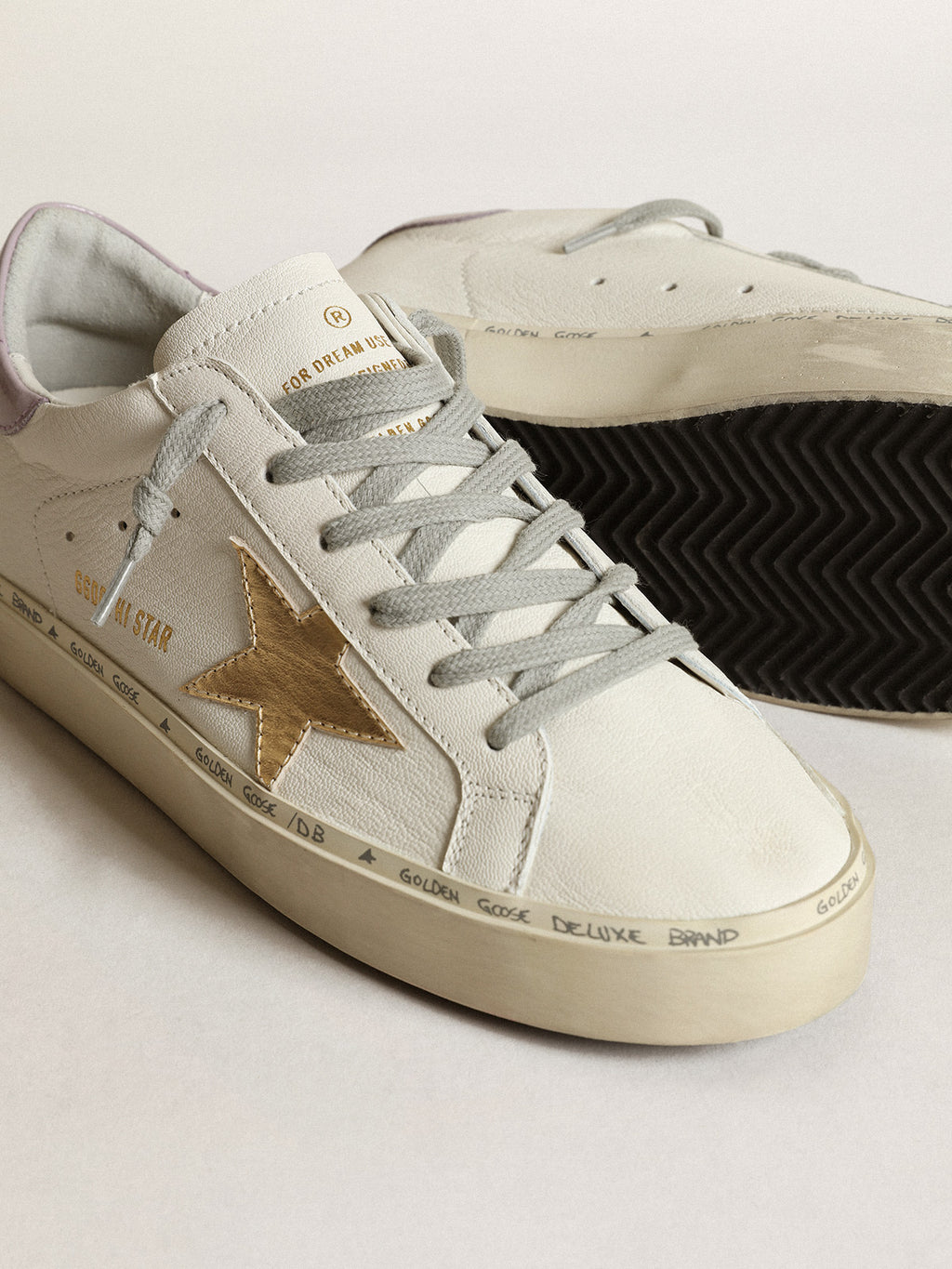 White Hi Star with a gold star and lilac naplak heel tab| Golden Goose