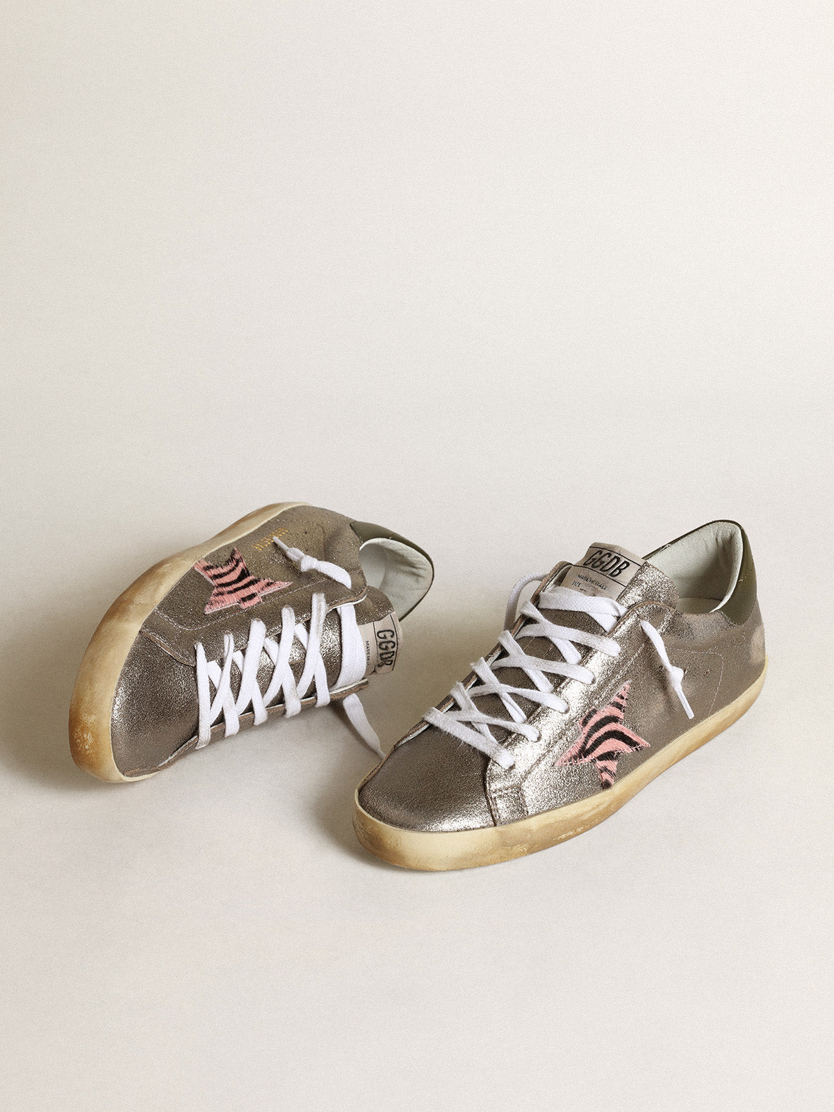 Super-Star LTD in gray laminated suede with a pony skin star| Golden Goose