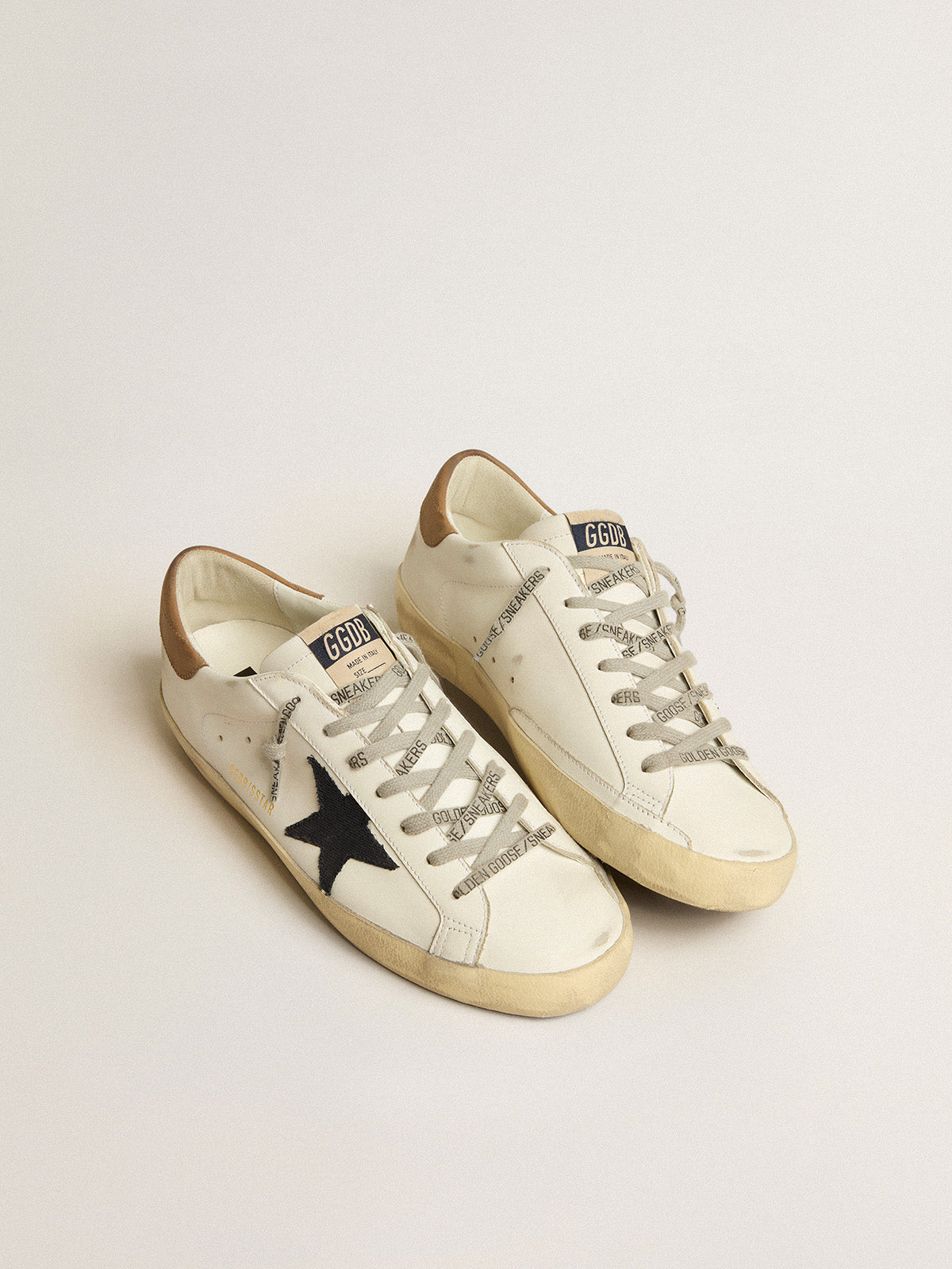 Super-Star with blue canvas star and tobacco leather heel tab| Golden Goose