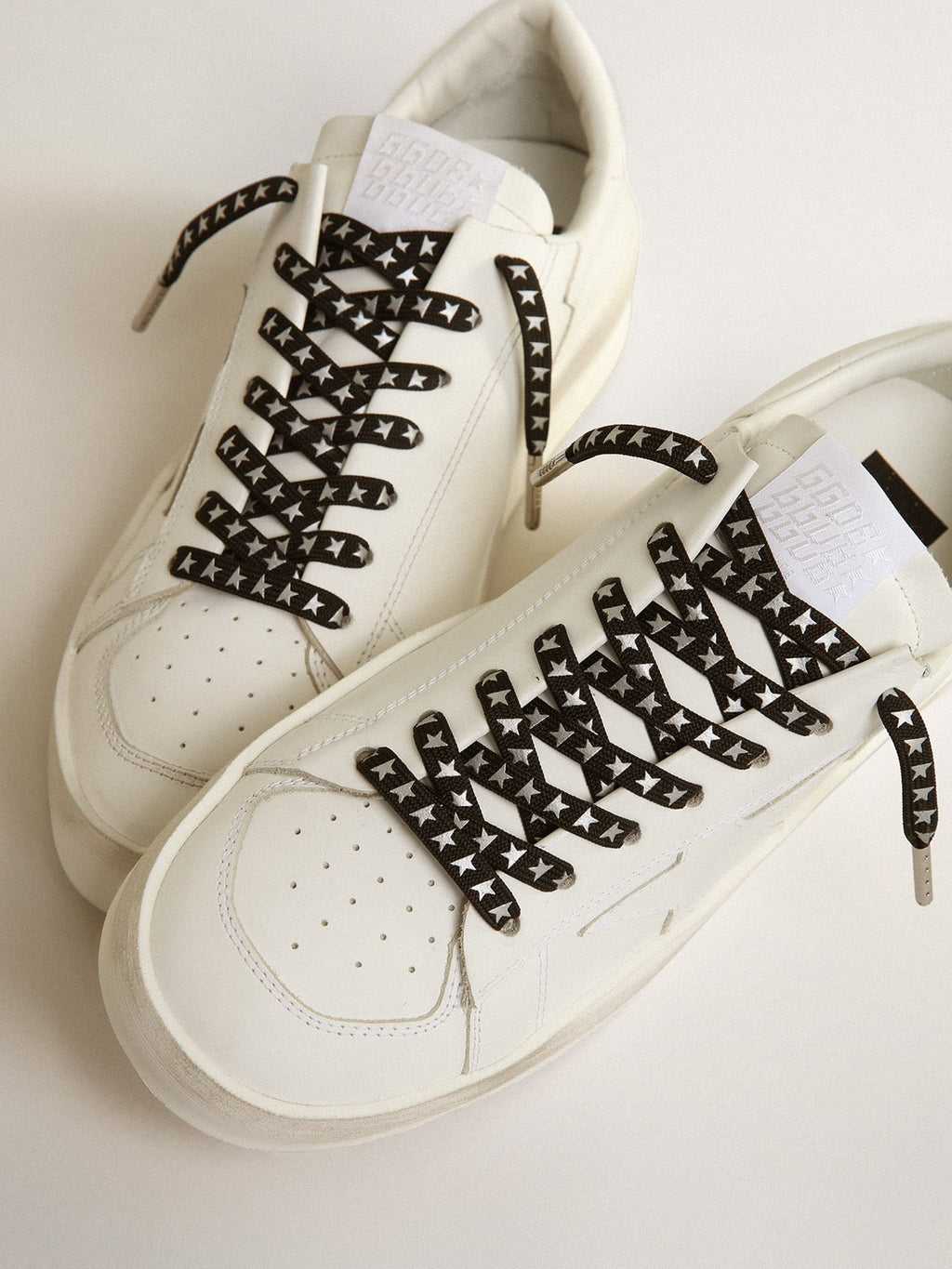 Black cotton laces with contrasting silver stars| Golden Goose