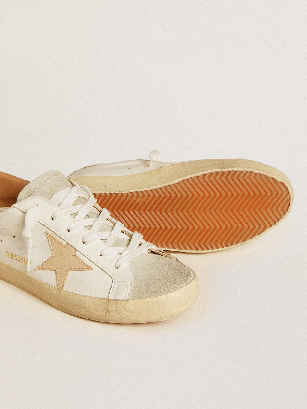 Super-Star with nude leather star and gold glitter heel tab| Golden Goose