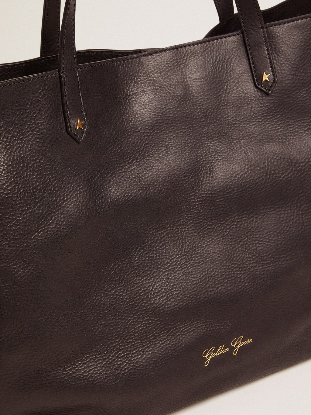 Pasadena Bag in black hammered leather with gold logo on the front| Golden Goose