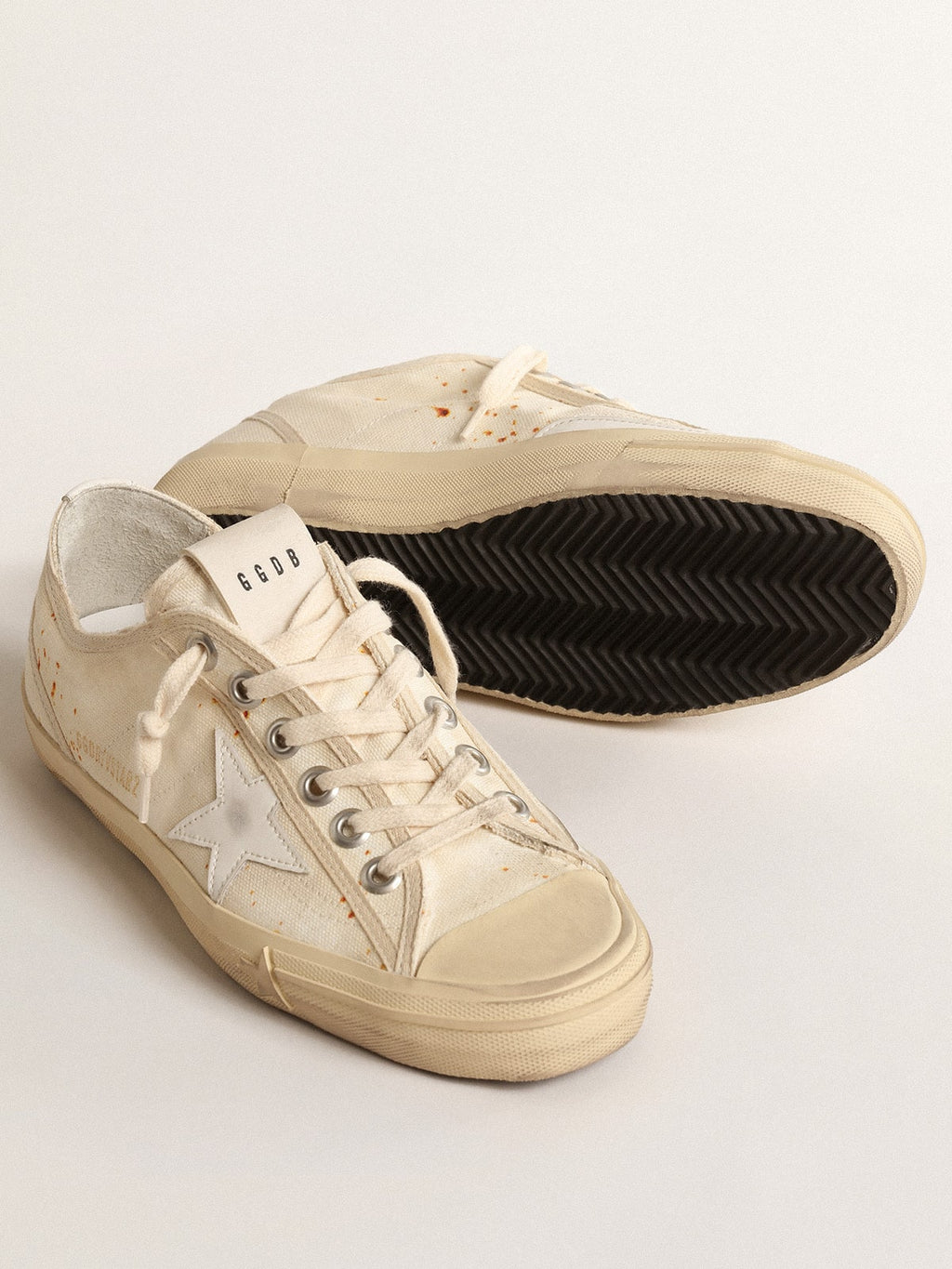 Women's V-Star LAB in canvas with leather star and rust-colored speckles| Golden Goose
