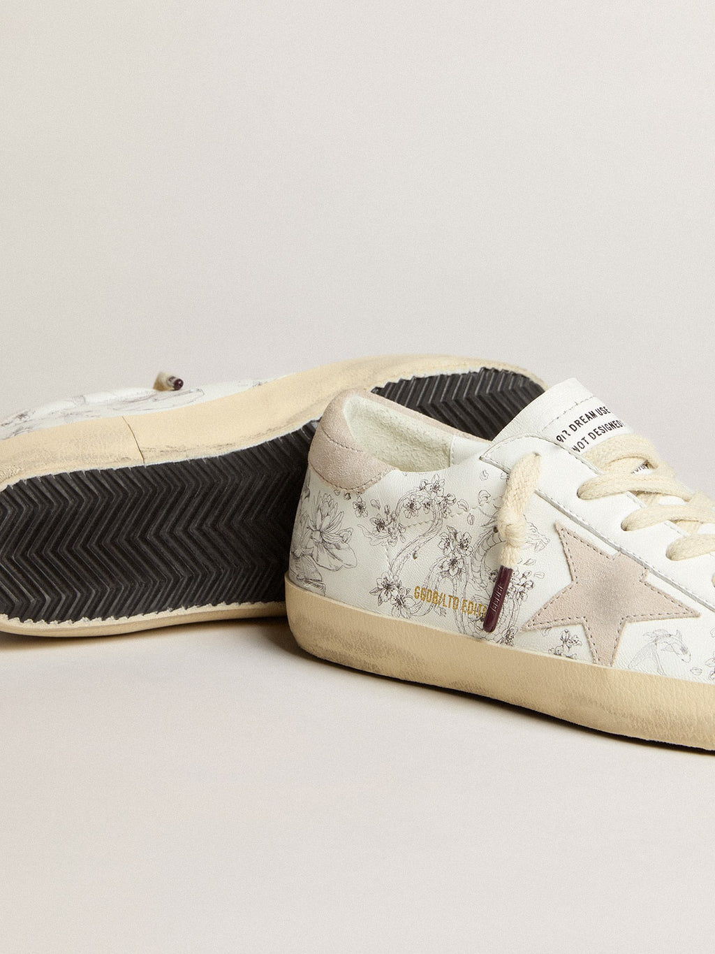 Women's Super-Star LTD CNY in white leather with lettering on the upper