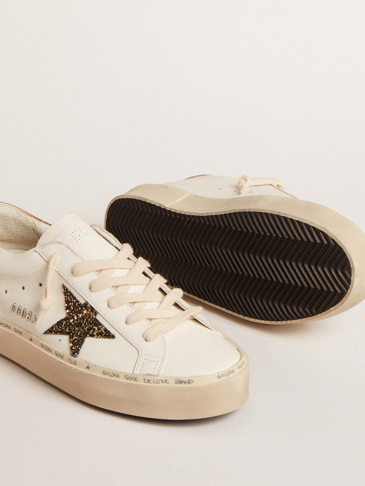 Hi Star LTD with black and gold glitter star and gold heel tab| Golden Goose