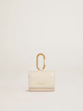 Worn white AirPod case| Golden Goose