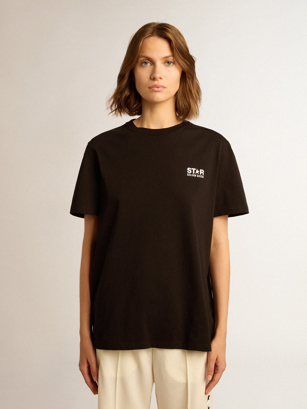 Black Star Collection T-shirt with contrasting white logo and star| Golden Goose