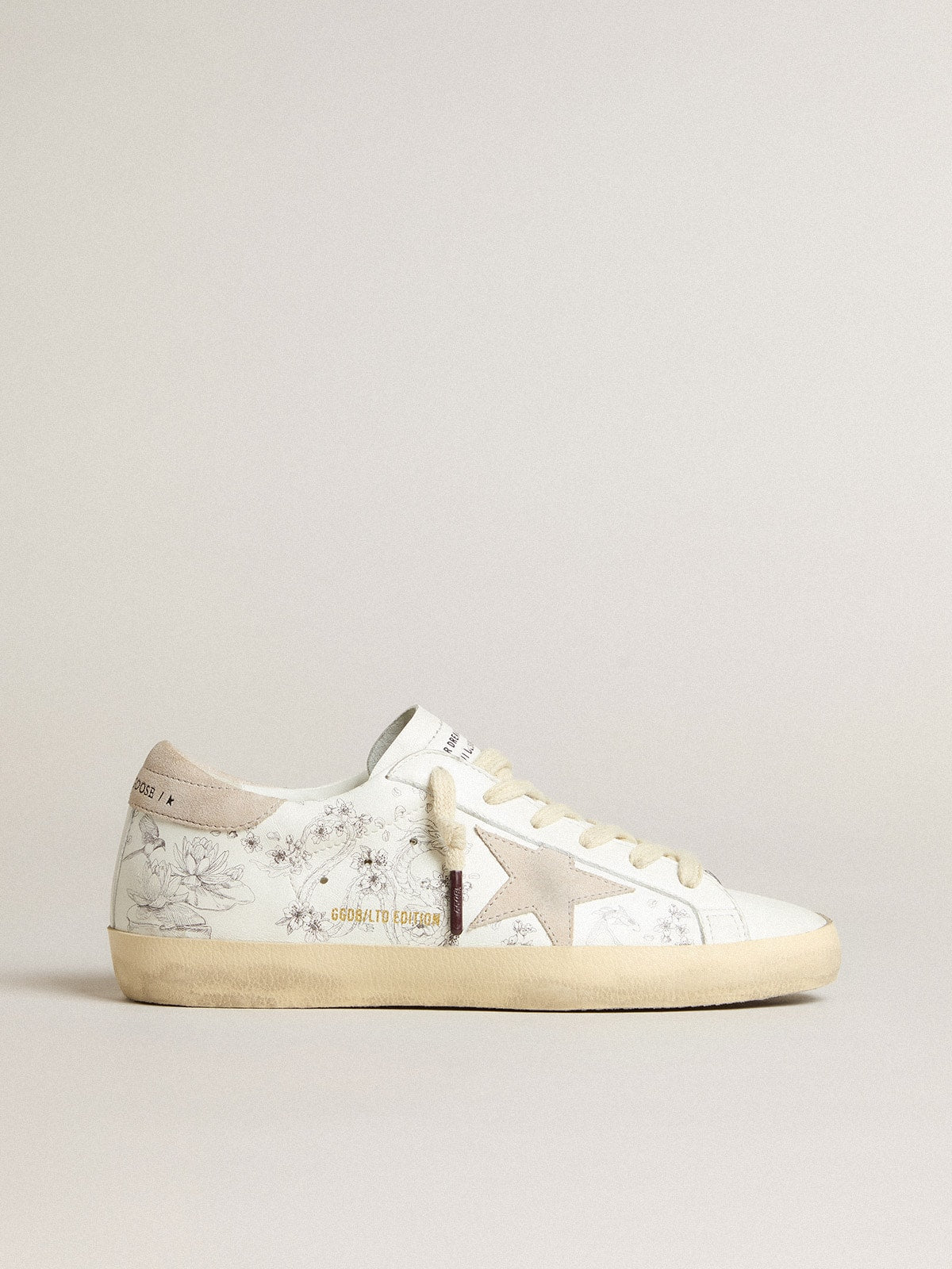 Women's Super-Star LTD CNY in white leather with lettering on the upper
