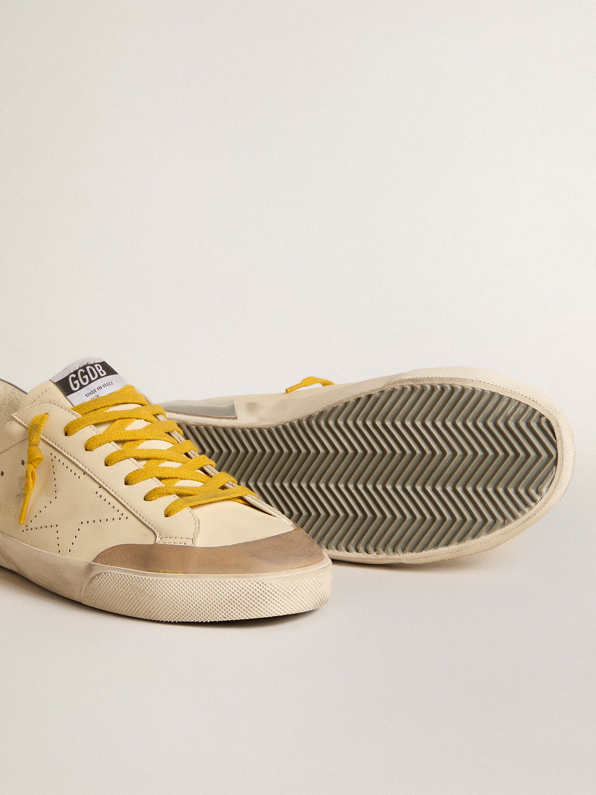 Super-Star in leather with perforated star and gray suede heel tab| Golden Goose