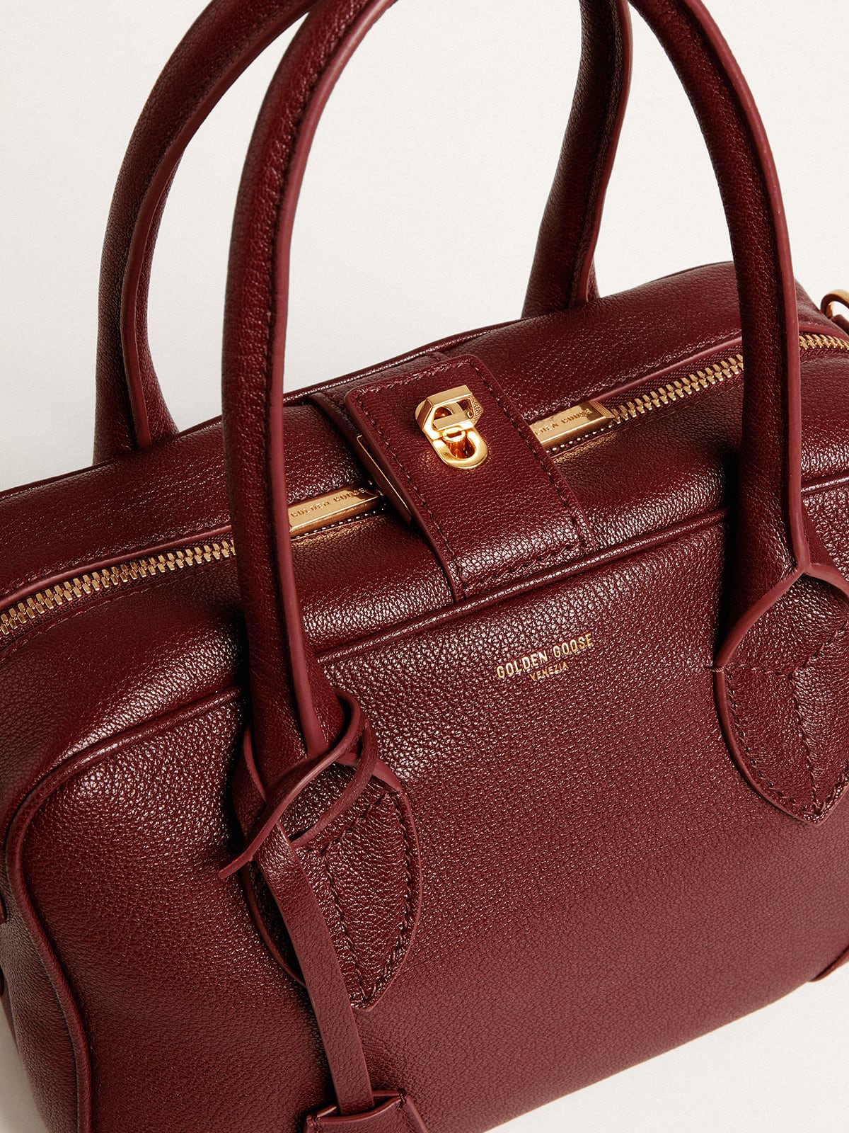 Vita Bag in burgundy sheepskin leather with gold details| Golden Goose