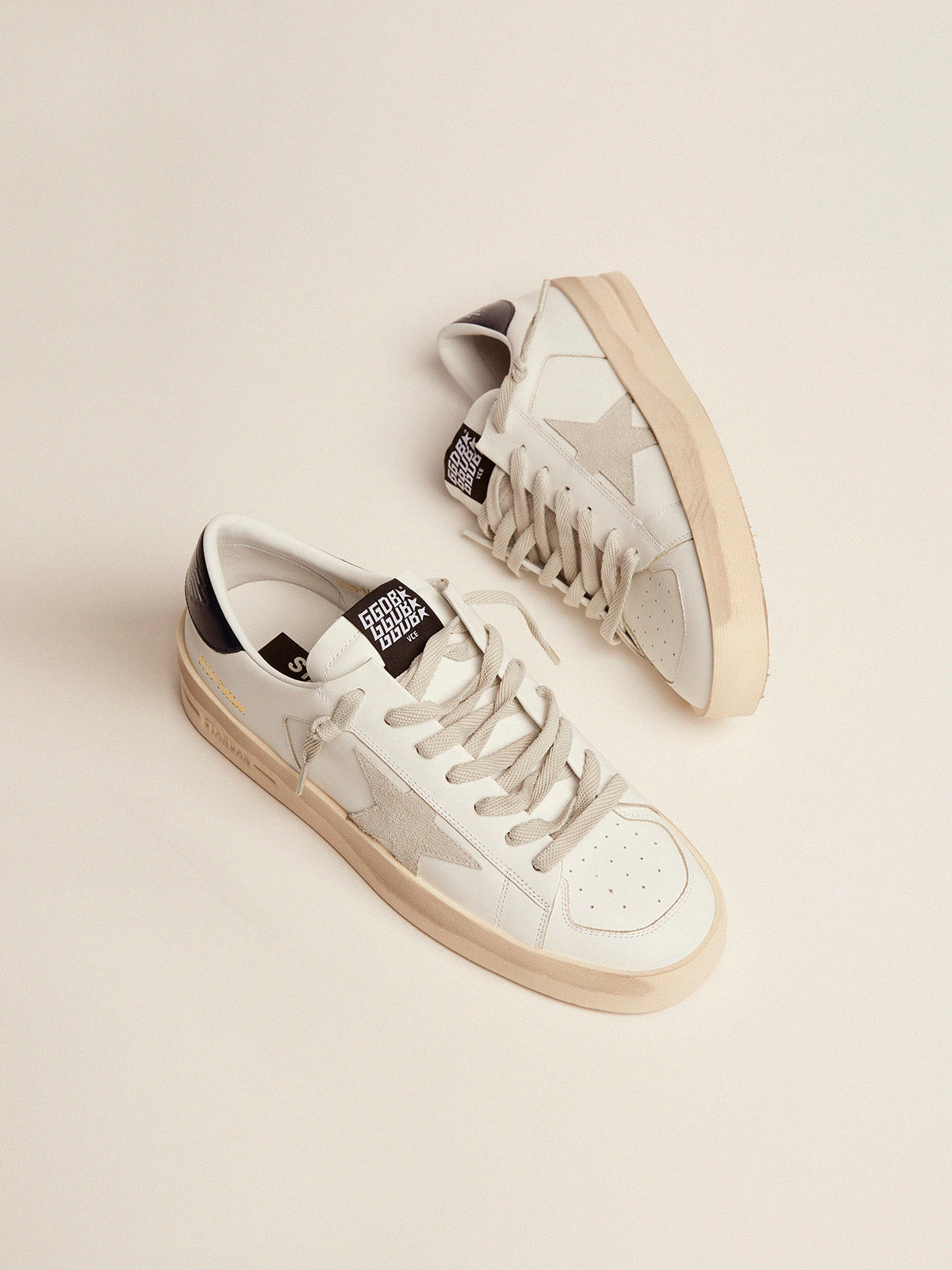 Men's Stardan with star in ice-gray suede and blue-navy heel tab| Golden Goose