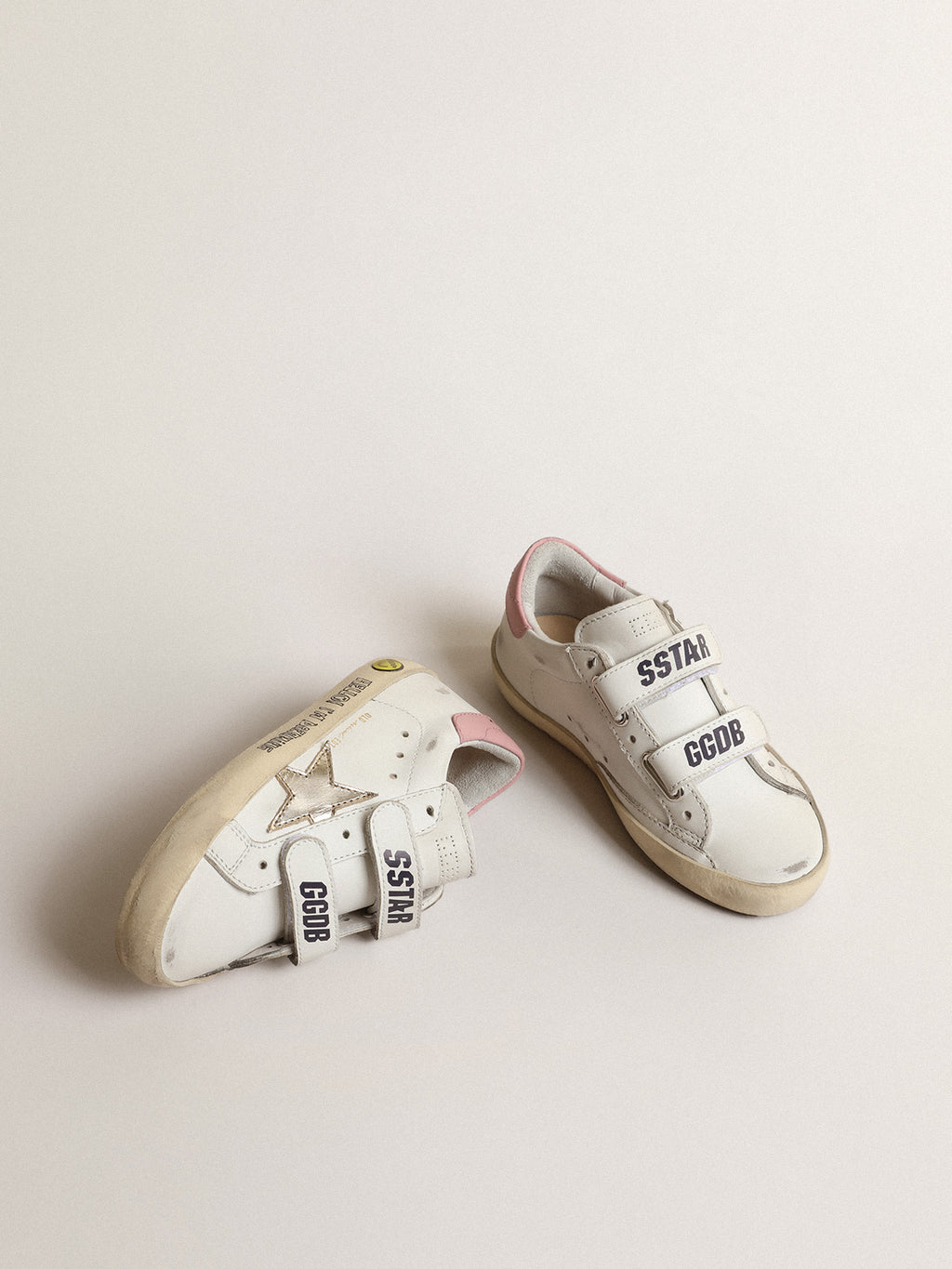 Old School Young with metallic leather star and pink heel tab| Golden Goose