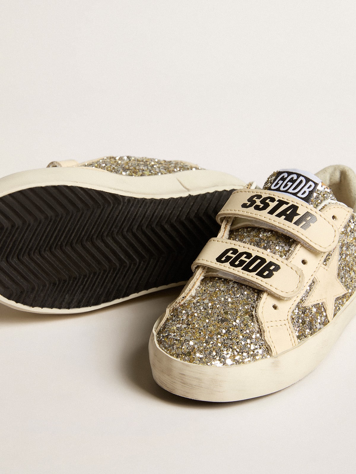 Old School Junior in platinum glitter with leather star and heel tab| Golden Goose