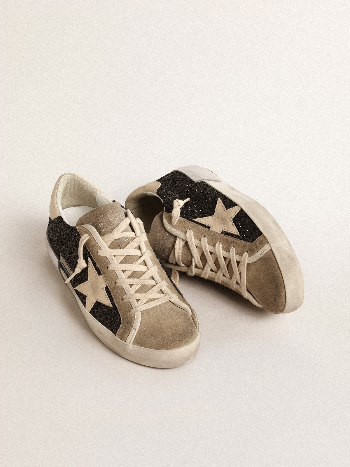 Super-Star in black glitter with cream star and suede inserts| Golden Goose
