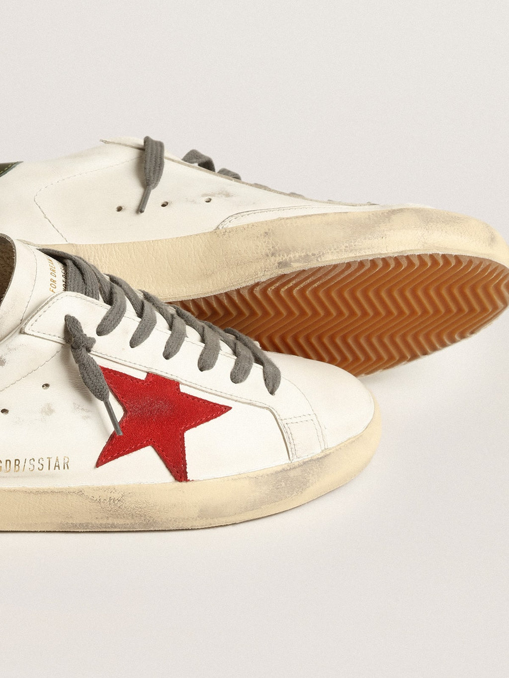 Men's Super-Star with red suede star and green leather heel tab| Golden Goose