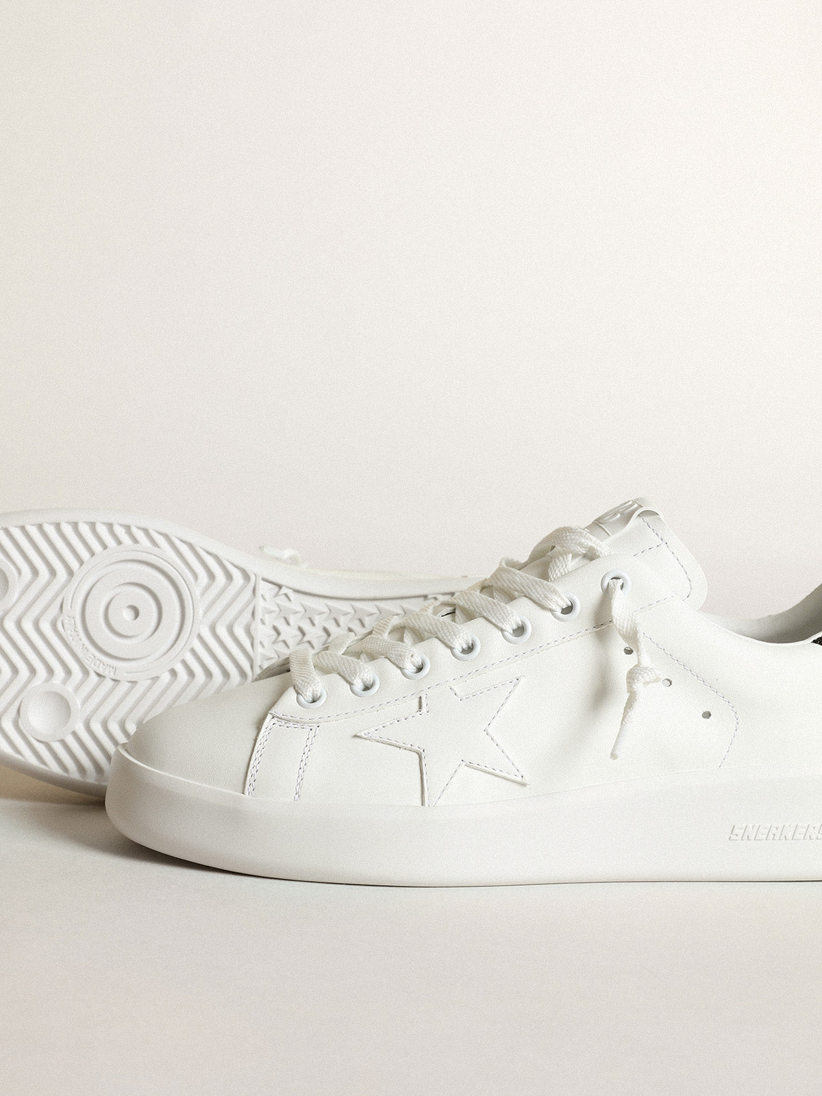 Purestar sneakers in white leather with tone-on-tone star and heel tab in black Swarovski crystals| Golden Goose