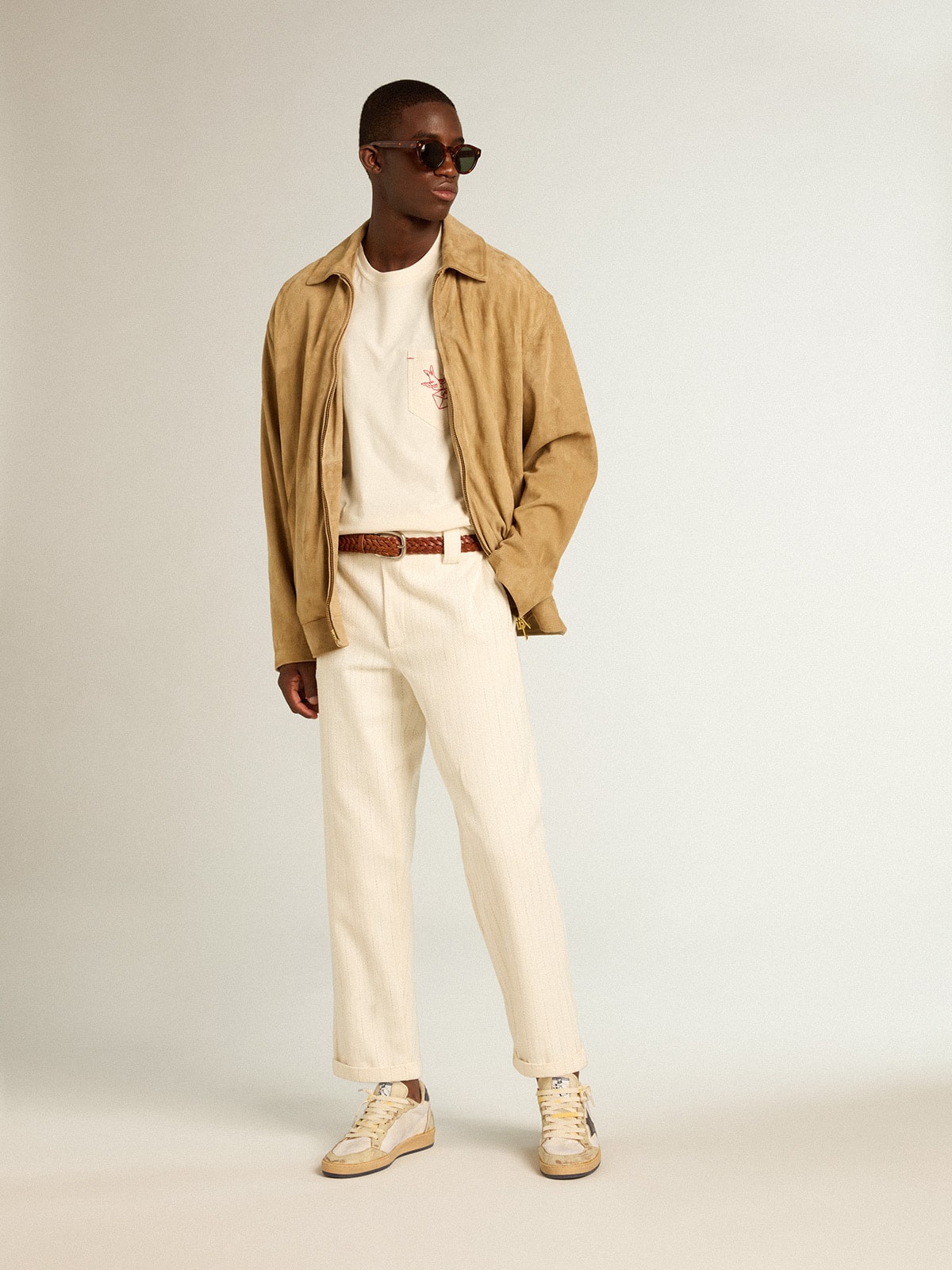 Beige-colored leather jacket with zip fastening