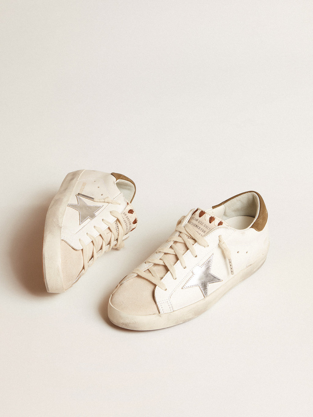 Super-Star LTD with metallic silver leather star and brown heel tab| Golden Goose