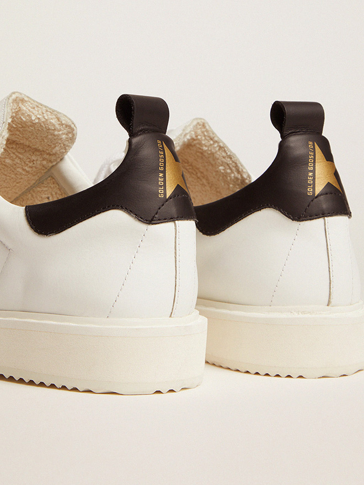 Starter sneakers in white leather with black leather heel tab| Golden Goose