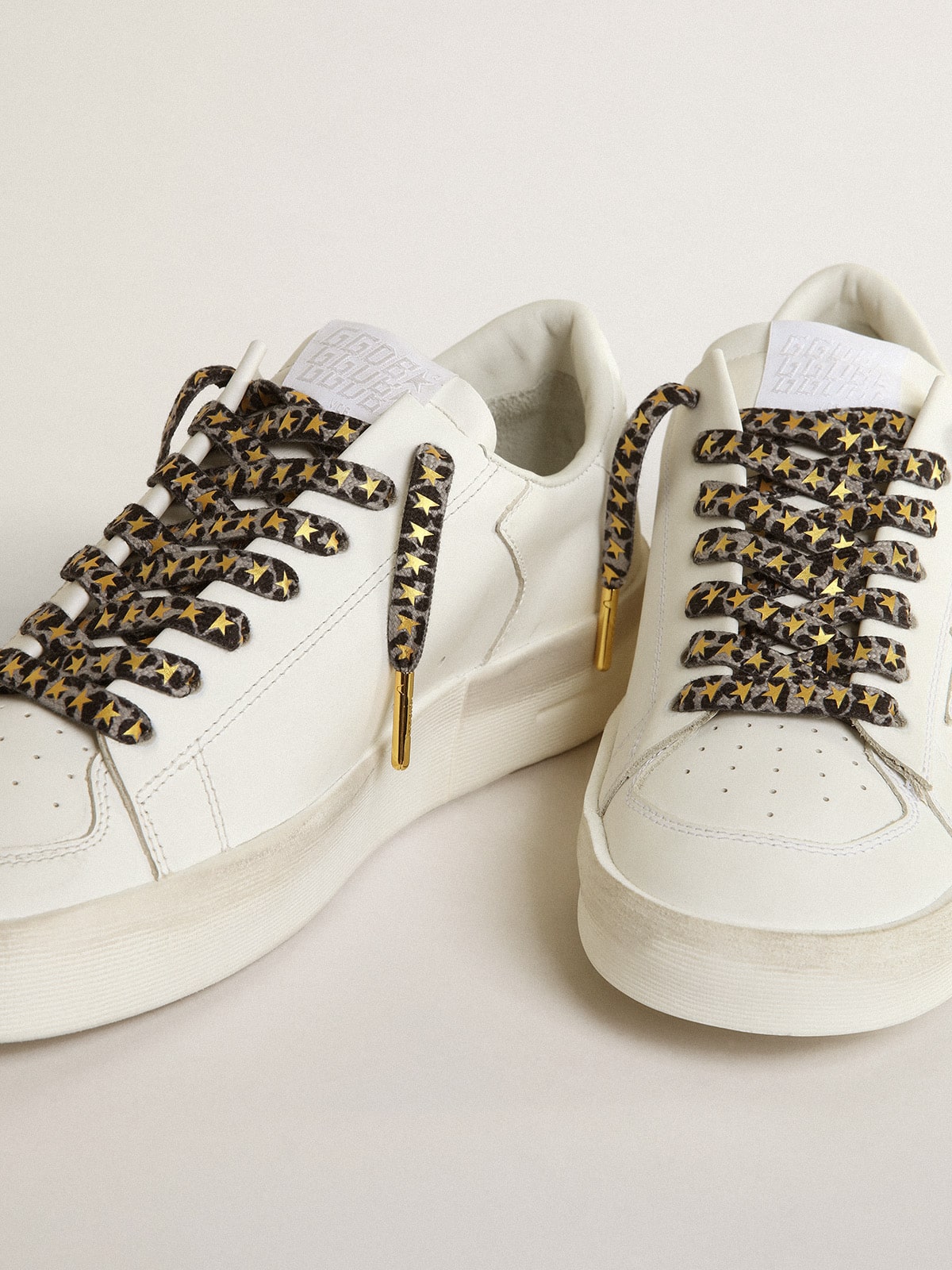 Laces with gray and black animal print with contrasting gold stars| Golden Goose