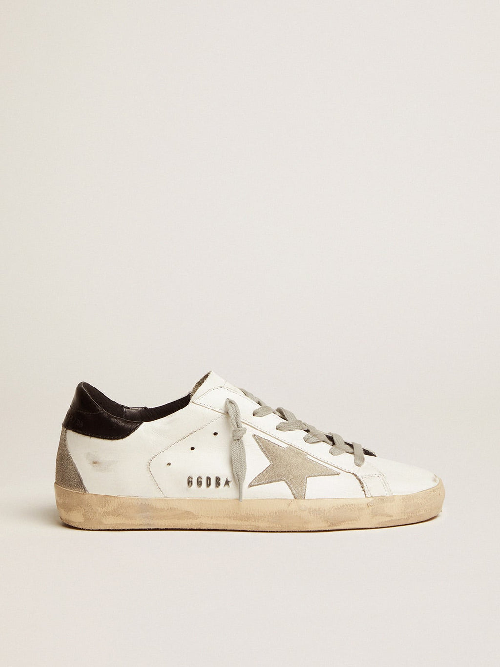 Women's Super-Star with black heel tab and metal stud lettering| Golden Goose