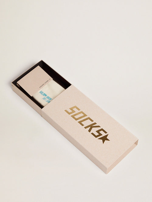 Distressed-finish white socks with turquoise logo and stripes| Golden Goose