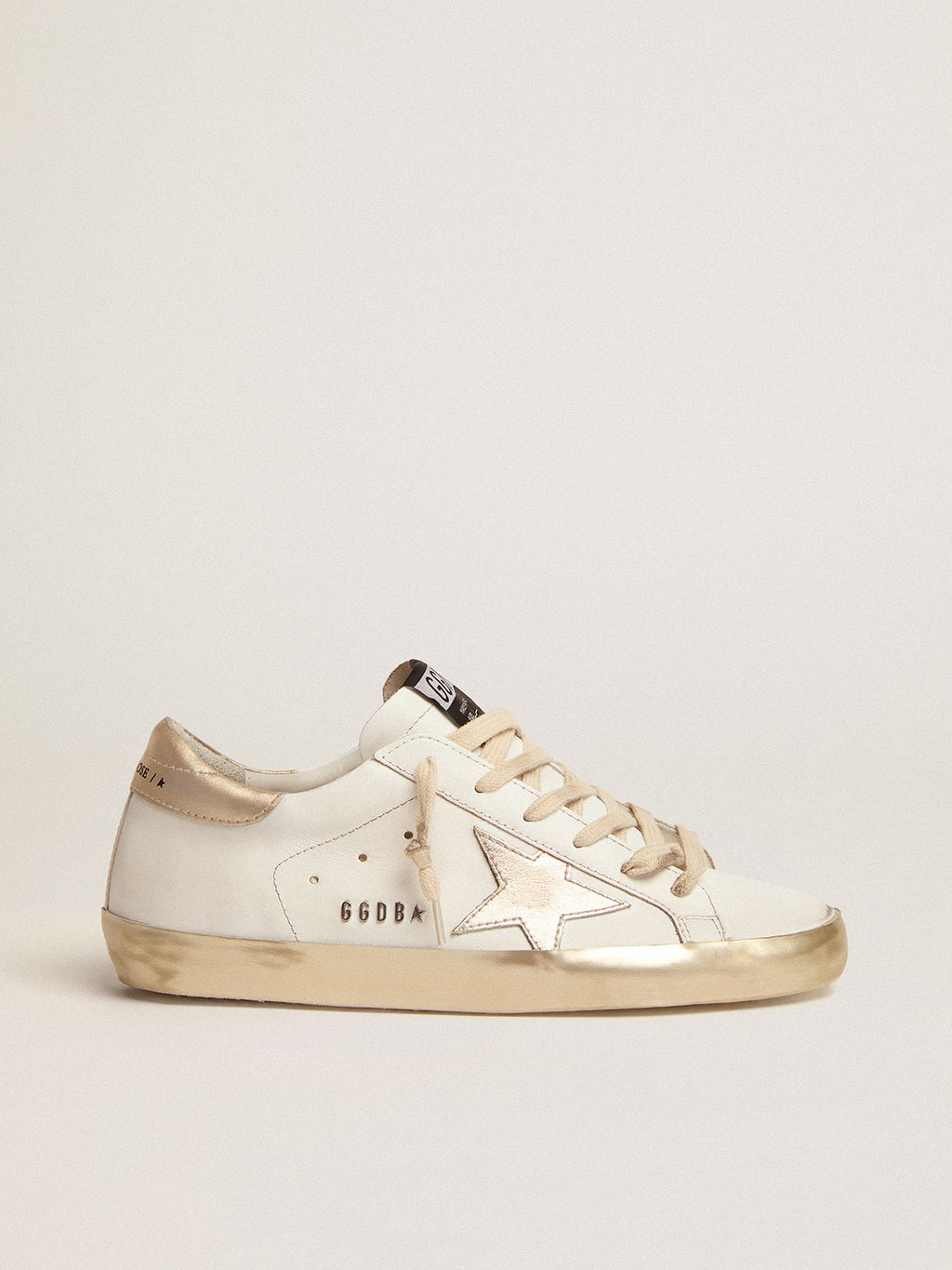 Women's Super-Star sneakers with gold foxing| Golden Goose
